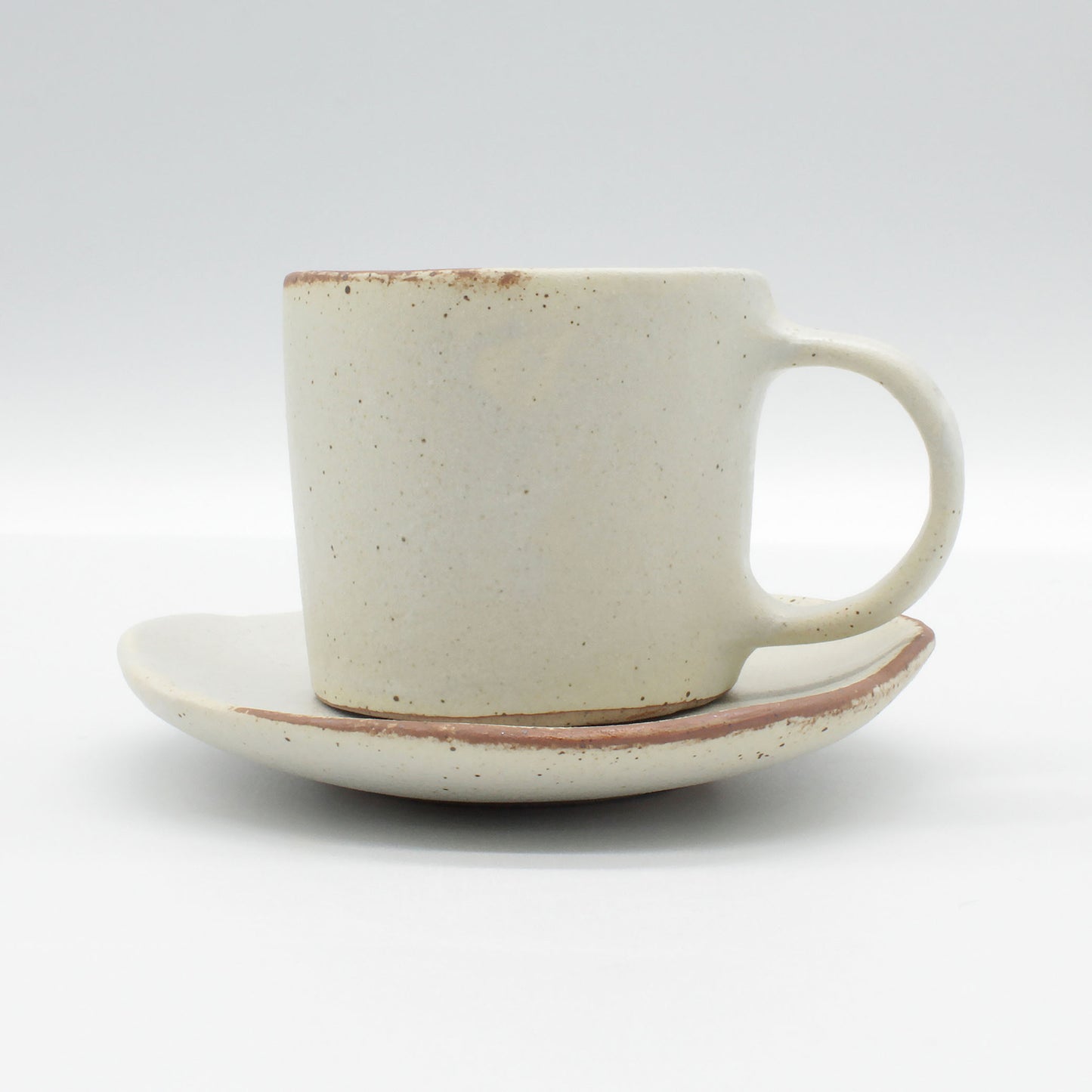 Lotus Double Espresso Set - antique white in colour with clay colour breaking up the white