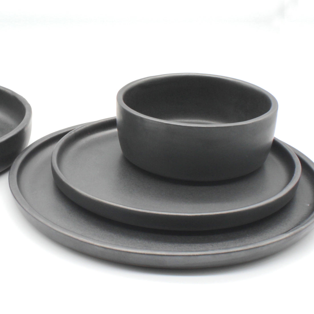 Black semi-gloss dinnerware. Dinner plate, side plate, and bowl