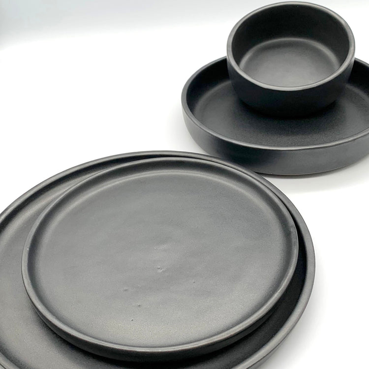 Beautiful, semi-gloss black ceramic table to suit all occasion. All types of food just looks stunning on this colour and surface! Each piece is unique and handmade in Thailand, shipped from UK to UK addresses.