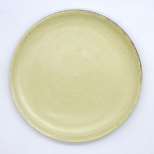 handmade ceramic plate from Thailand yellow colour rustic natural look