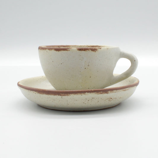 Handmade ceramic Lotus espresso cup and saucer - antique white in colour with touches of clay colour