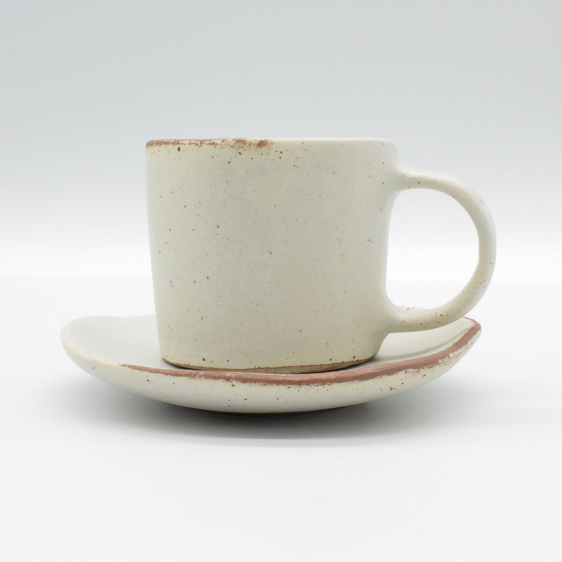 Lotus Double Espresso Set - antique white in colour with clay colour breaking up the  white