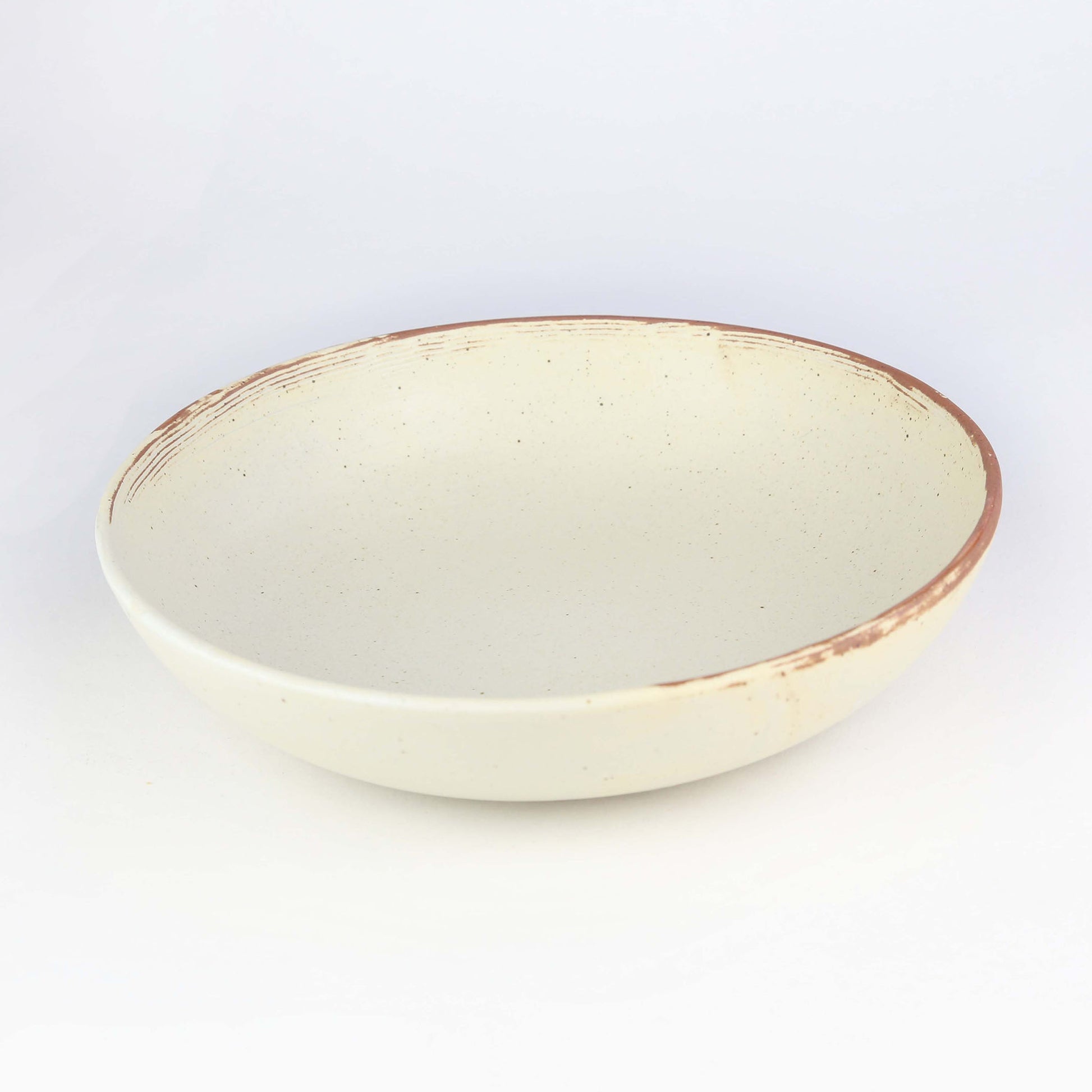 Handmade ceramic antique white colour pasta bowl with touches of clay colour