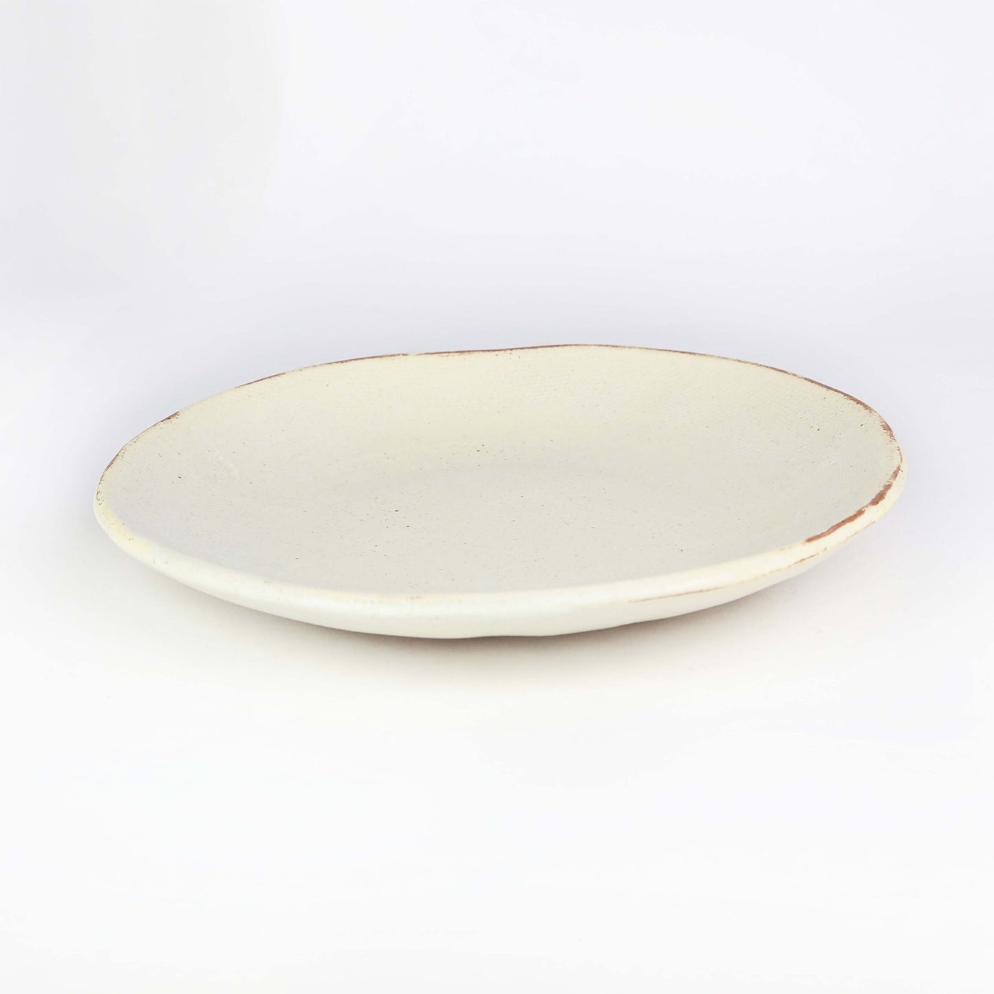 Side view of a side plate from our Moke collection.