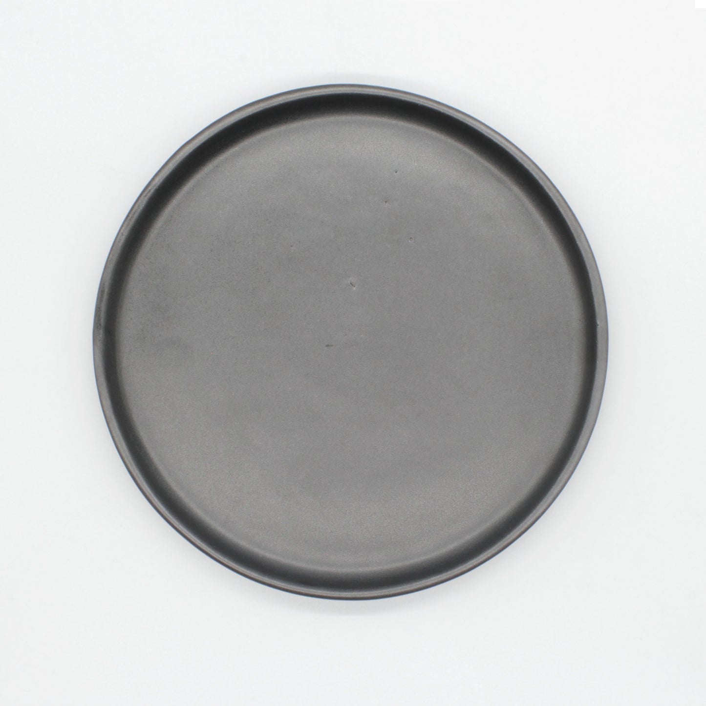 Overhead view of Tharn side plate. The Tharn collection is our black semi-gloss collection, that will enhance the appeal of each dish that you may serve.